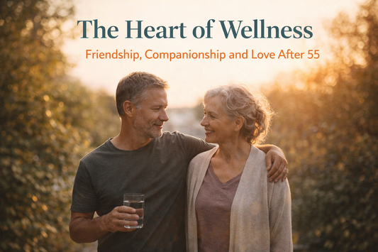 Midlife couple walking together at sunset, smiling and relaxed, illustrating friendship, companionship and love after 55.