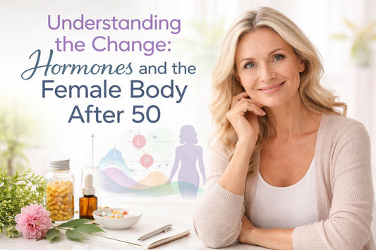 Smiling woman over 50 seated at a desk with supplements and wellness journal, illustrating hormone changes and female health after menopause in midlife.