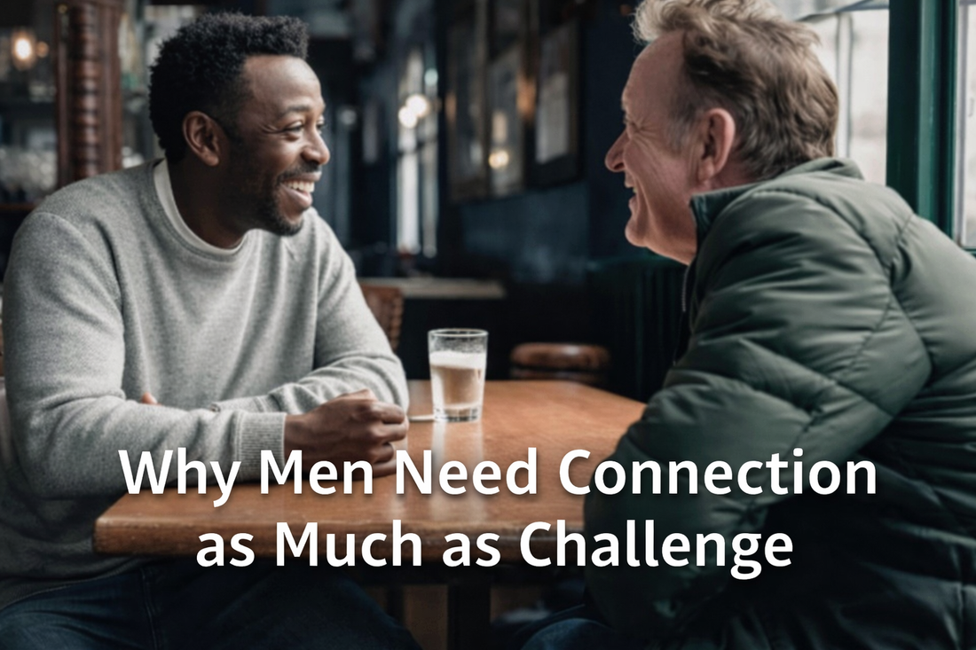 “Two middle-aged men talking and smiling across a table in a pub, illustrating male friendship and connection.”